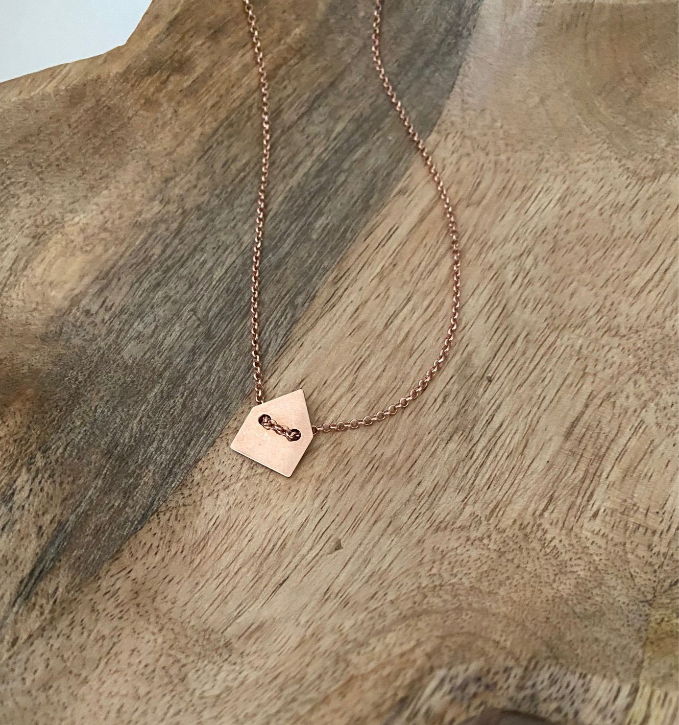 Collana "casa a bottone"