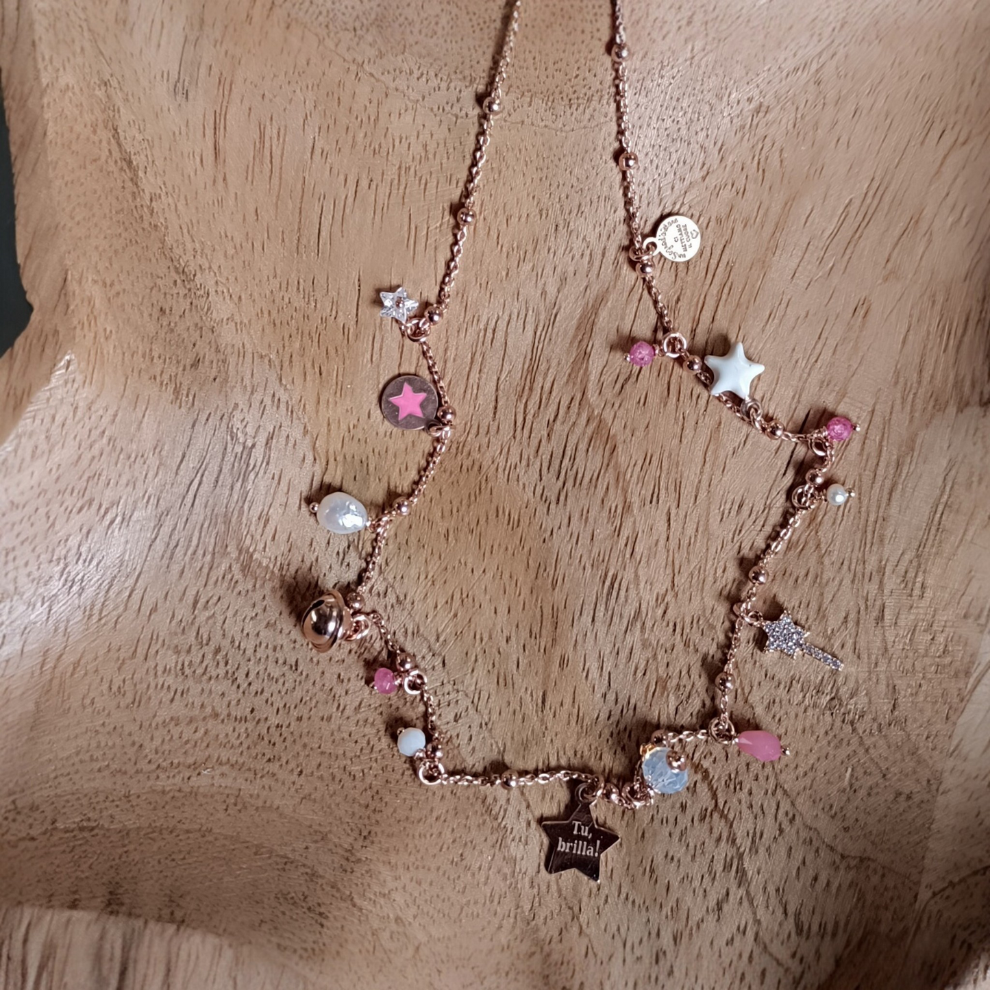 Collana miniLucilla nei toni bianco, rosa e fucsia con inserimento di stella "tu brilla!"
