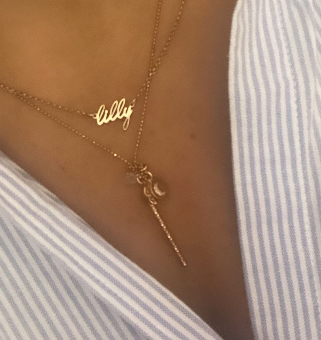 Collana "portamifortuna" con bacchetta lavorata