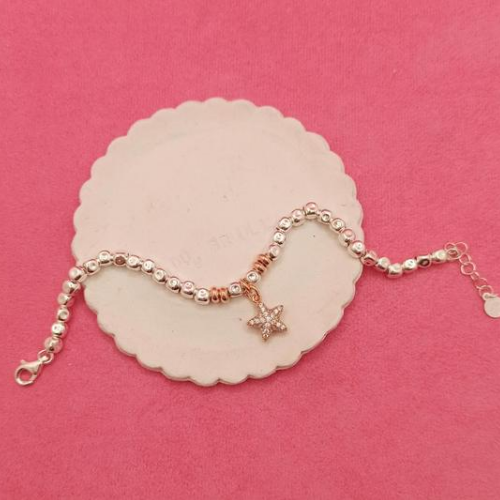 Bracciale pepite martellate grandi con stella in zirconi